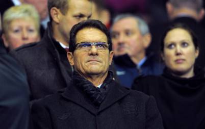England's manager Fabio Capello looks on