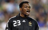 France's goalkeeper Steve Mandanda reacts against Ecuador in their friendly soccer match at Stade des Alpes in Grenoble , French Alps