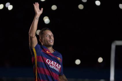 BARCELONA, SPAIN - AUGUST 05: Adriano Correia of FC Barcelona waves during the official team presentation ahead of the Joan Gamper trophy match at Camp Nou on August 5, 2015 in Barcelona, Spain. (Photo by Albert Llop/Anadolu Agency/Getty Images)