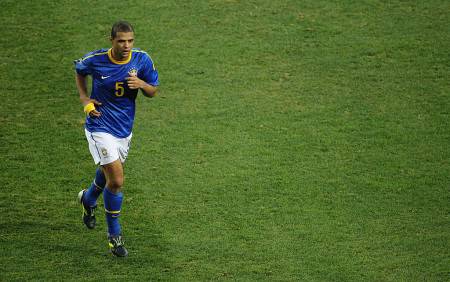 PORT ELIZABETH, SOUTH AFRICA - JULY 02: Felipe Melo of Brazil walks off the pitch after being sent off following a tackle on Arjen Robben of the Netherlands during the 2010 FIFA World Cup South Africa Quarter Final match between Netherlands and Brazil at Nelson Mandela Bay Stadium on July 2, 2010 in Nelson Mandela Bay/Port Elizabeth, South Africa. (Photo by Doug Pensinger/Getty Images)