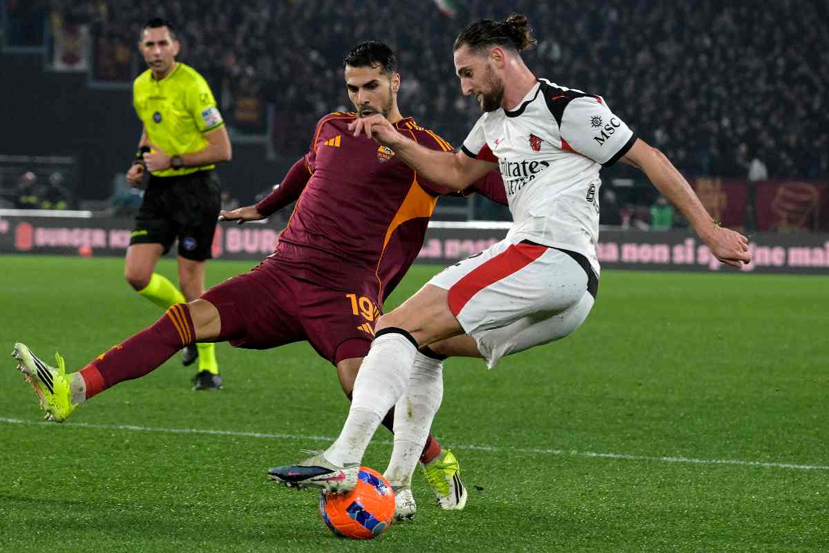 Celik contrasta Rabiot durante Roma-Milan