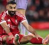 Momo Salah a terra con la maglia del Liverpool